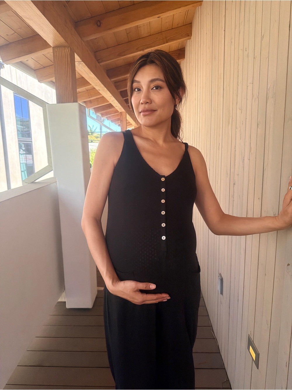 Hatch Black Sleeveless Jumpsuit with Button Front